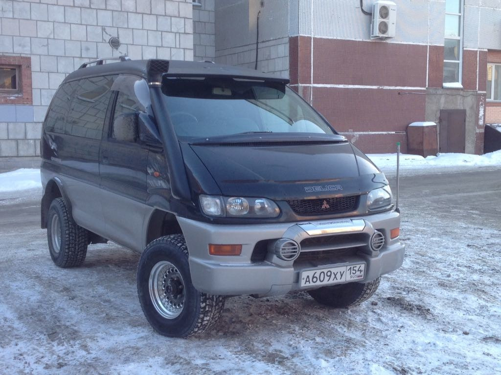 Купить бу мицубиси делику. Delica l400. Тойота Делика 1995. Мицубиси Делика д4. Делика Рестайлинг.