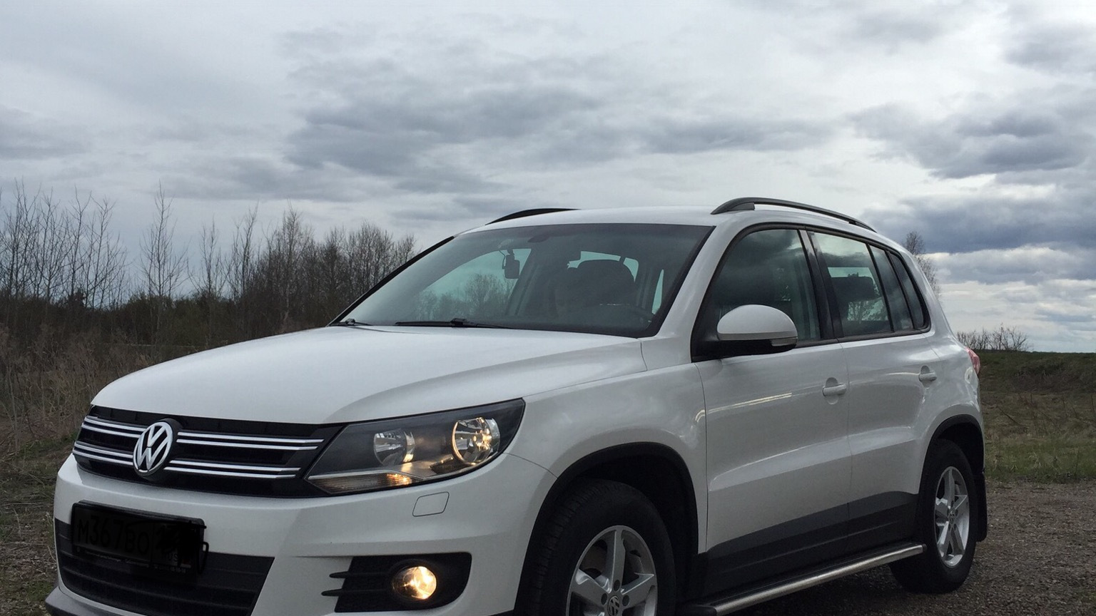 Тигуан с пробегом краснодарский край. Tiguan 2013 1.4 150. Обвес Volkswagen Tiguan 2013. Тюнинг Тигуан 1. Тюнинг Тигуан 2013 год белый полный привод.