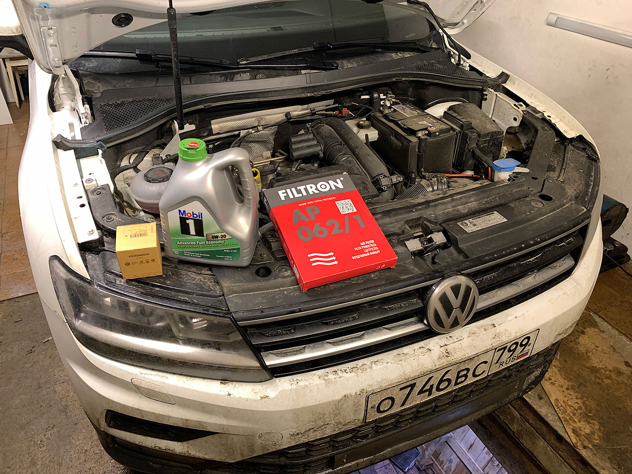 Как установить гос номер vw tiguan. Тигуан 2 чип тюнинг 2. Передняя подвеска тигуан 1 рестайлинг. Масляный сервис фольксваген. Новый тигуан мокрый асфальт.