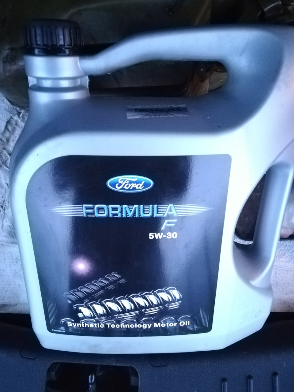 Моторное масло форд фокус 2 1.8. Ford Formula f новая этикетка. Масло Форд новая этикетка. Масло Форд фокус 2 дорестайлинговое фото.
