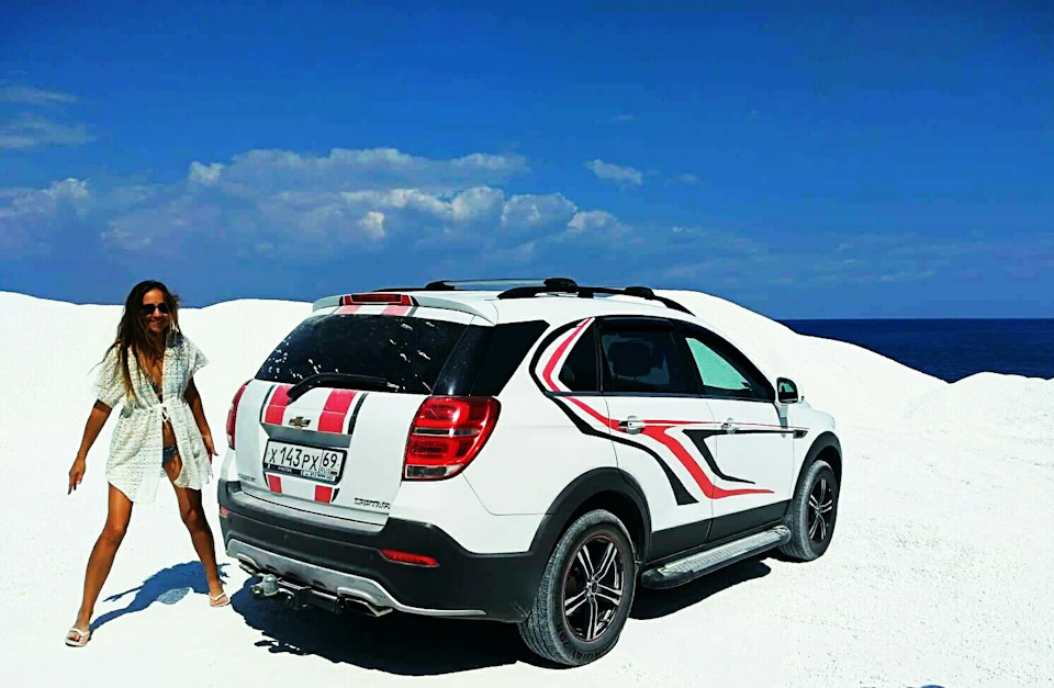 Chevrolet captiva белый