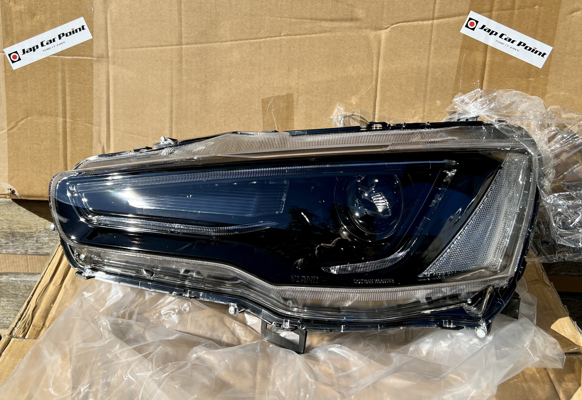 Фары AudiStyle в Lancer X — Mitsubishi Lancer X, 2,4 л, 2008 года