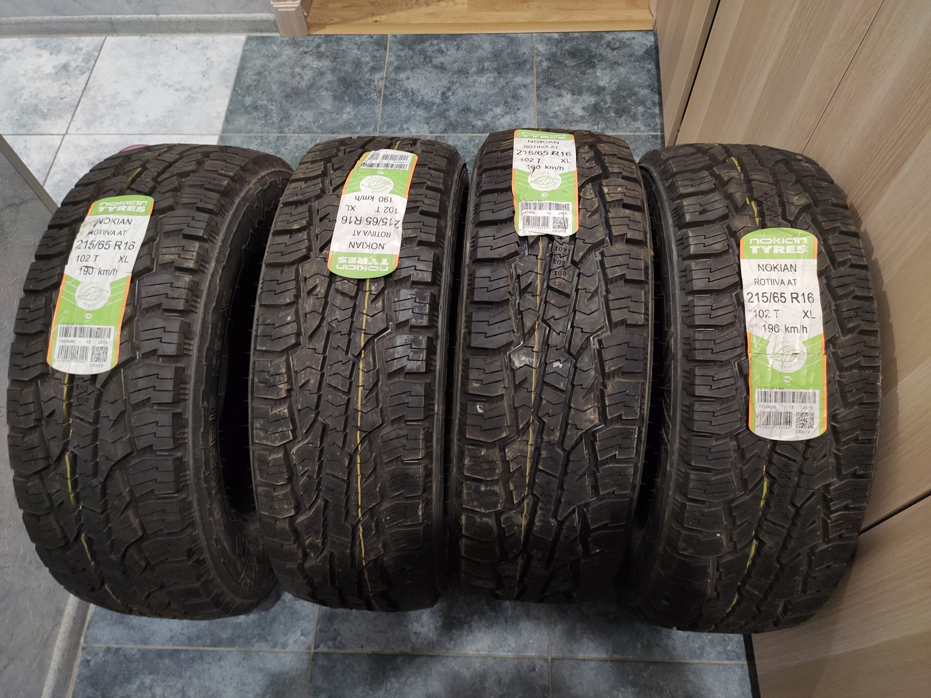 Резина нокиан 215. Нокиан АТ 215/65 r16. 215/65 Р16 Nokian Rotiiva at. 215/65 R 16 98t Nokian Tyres Outpost at. Nokian Rotiiva at.