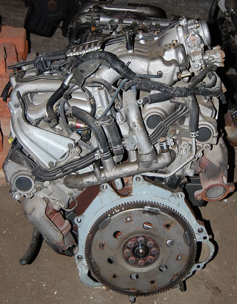 Mitsubishi pajero двигатель 3. Mitsubishi 6g74 v6 3.5. Мотор 6g74 Паджеро. Двигатель Mitsubishi 6g74. 6g74 DOHC MPI.