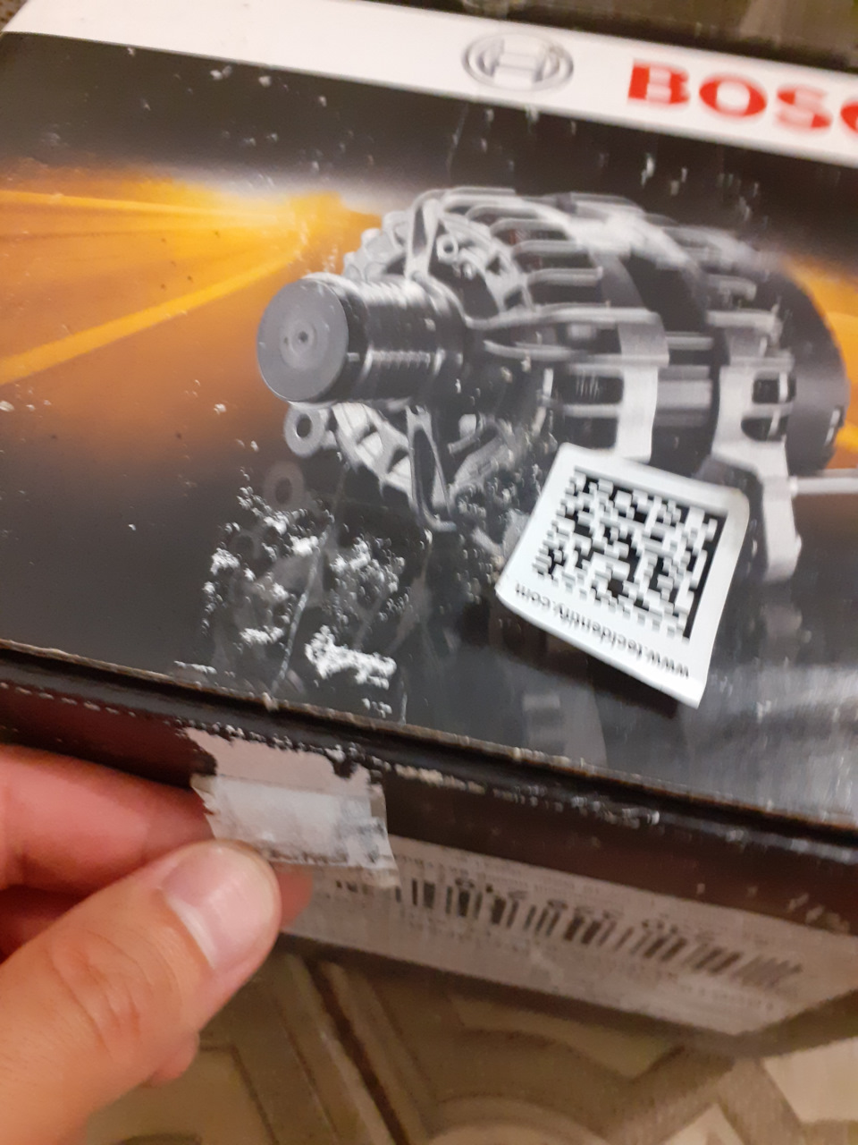 Пока фоткал коробку для Bosch, обратил внимание, что 1 половинка голограммы походу расклеивалась — Opel Astra H