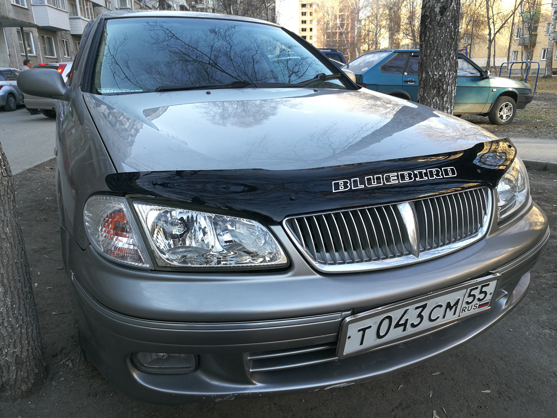 Ниссан блюберд силфи g10. Nissan Bluebird Sylphy g10. Бампер с омывателем фар Bluebird Sylphy g11.