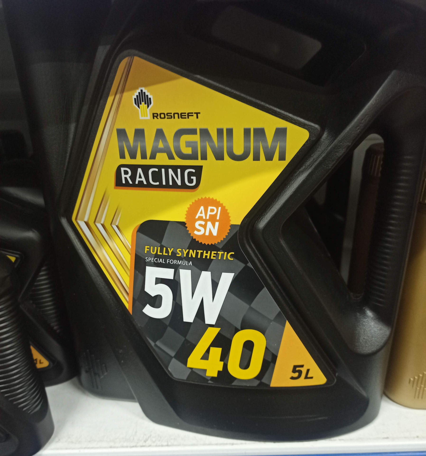 Роснефть рейсинг отзывы. Magnum Racing 5w-40. Rosneft Magnum Racing 5w-40. Роснефть Магнум рейсинг.