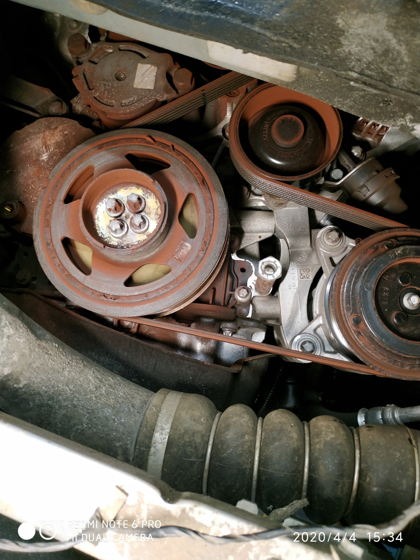 Замена роликов ремня привода механизмов — BMW 2 series Gran Tourer (F46 ...