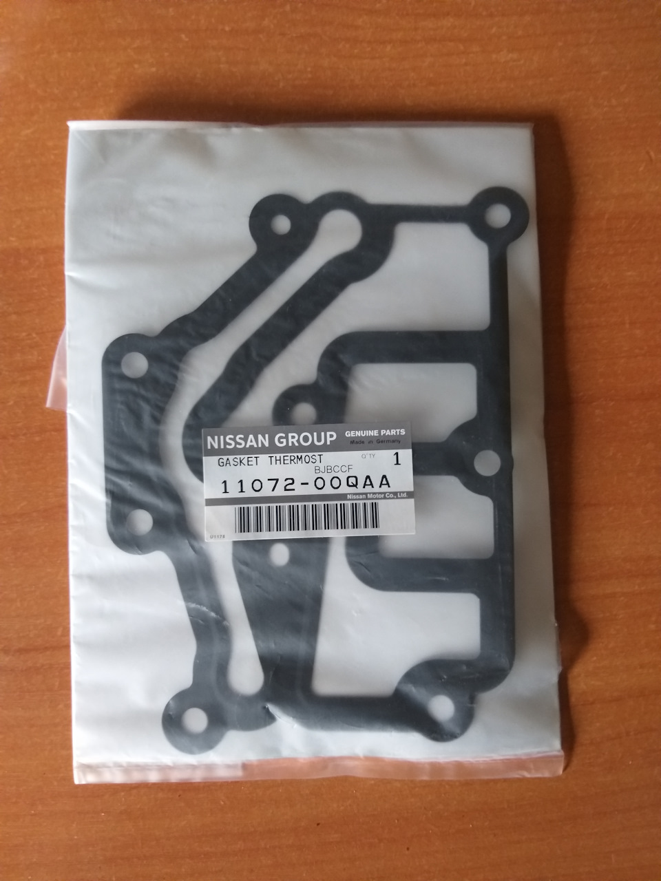 Прокладка термостата — Renault Megane II. Запчасти на фото: 1107200QAA