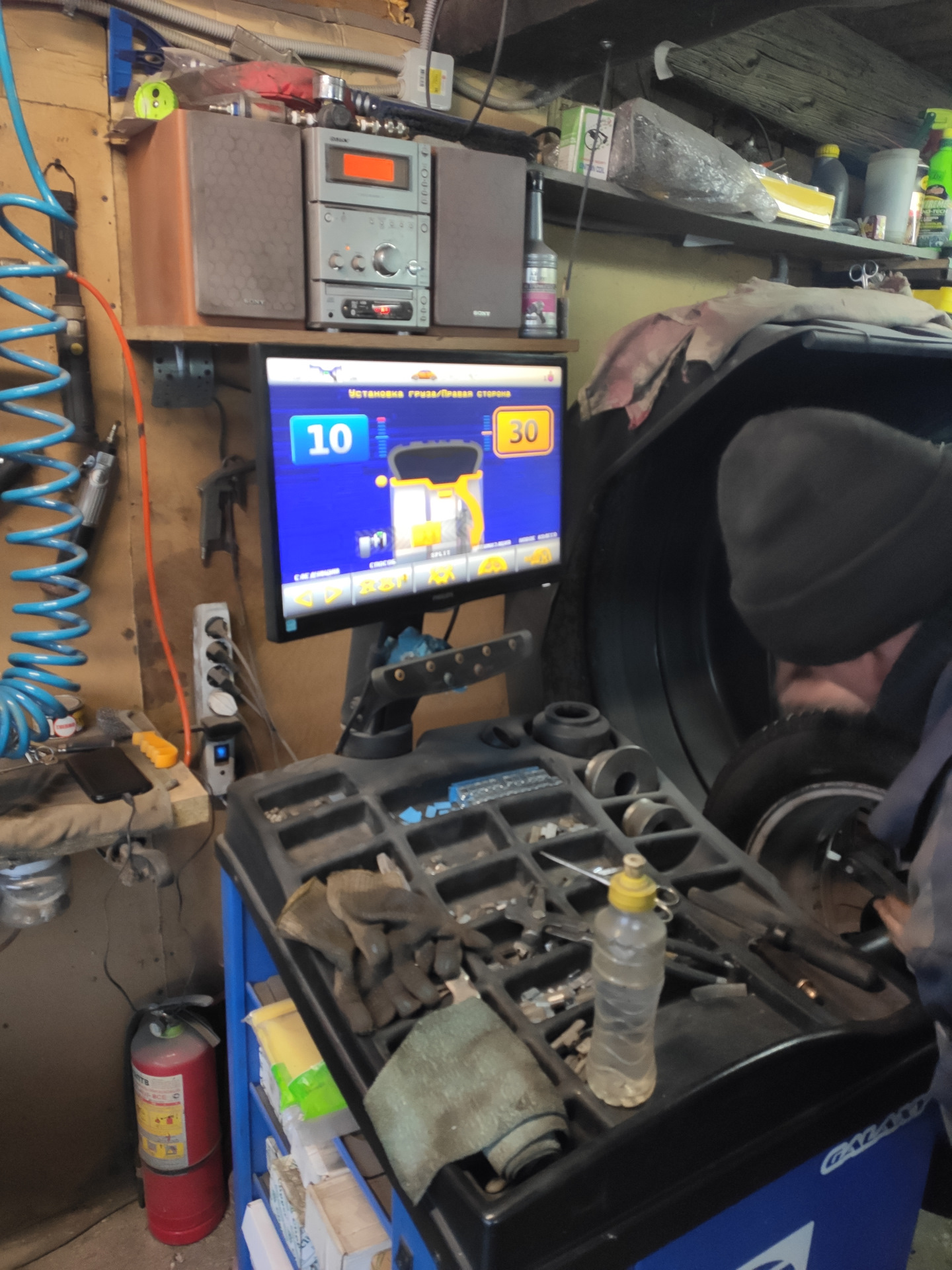 Перебортировка и балансировка зимних колес — KIA Sportage (3G), 2 л ...