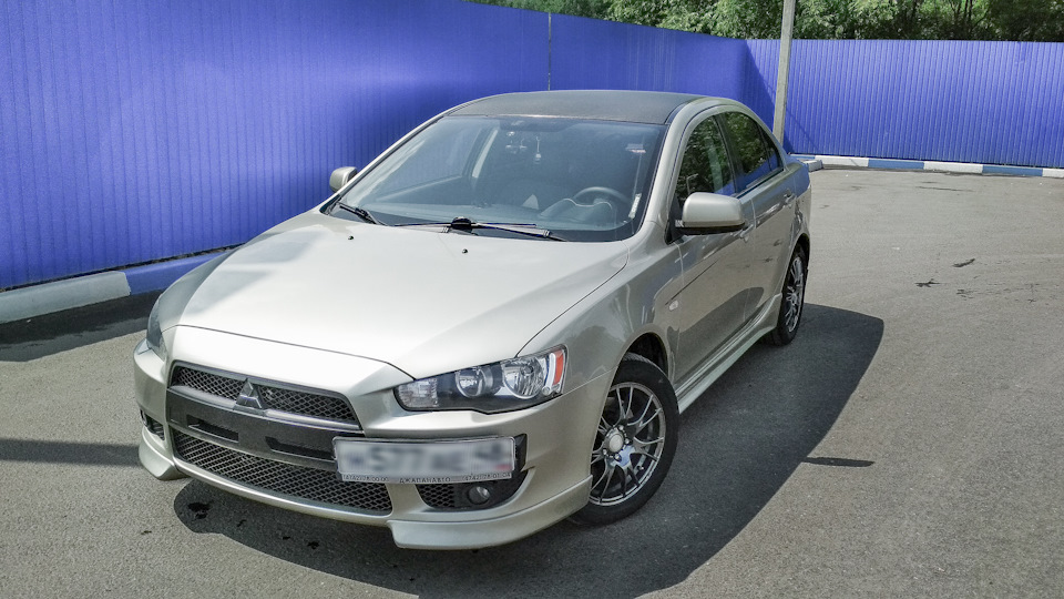 Кондиционер mitsubishi lancer. Ноускат Mitsubishi Lancer 10. Плавники на крышу Лансер 10.