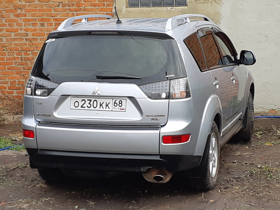 Outlander xl 2.4. Мицубиси Outlander 2004 год гос номер. Mitsubishi Outlander 2009 года с гос номера. Митсубиси Аутлендер гос номер 850. Номер м442мм Outlander.