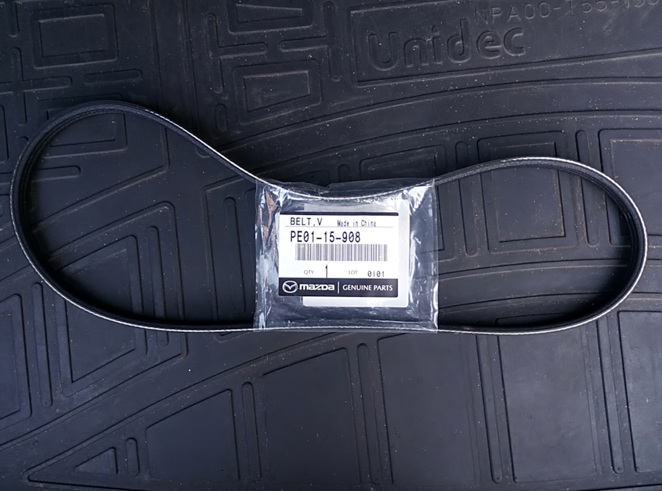 PE0115908 Ремень поликлиновой Mazda | Запчасти на DRIVE2