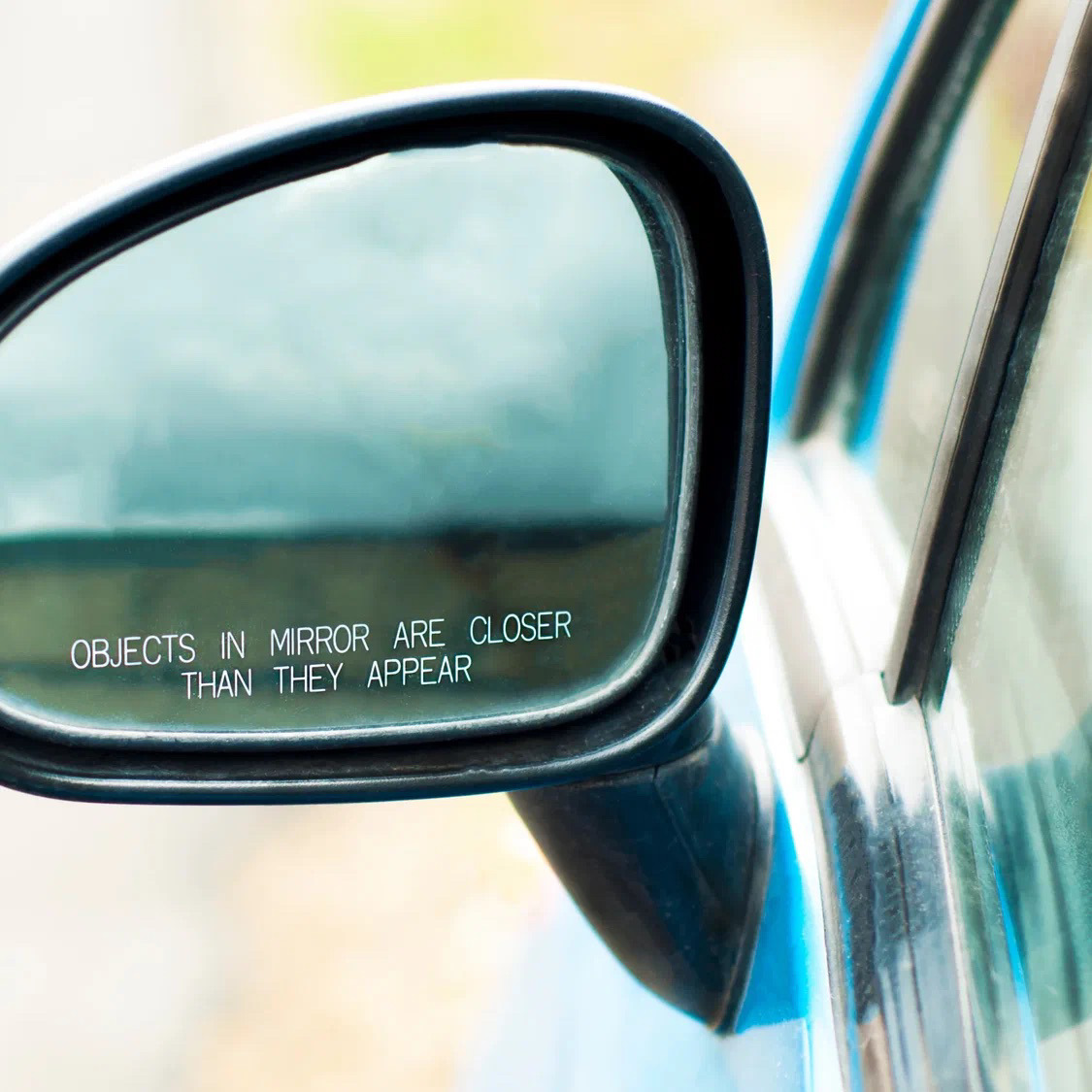 Objects in mirror are