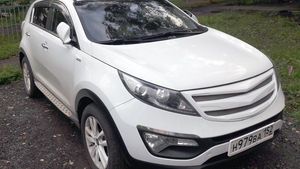 KIA Sportage "Беленький"