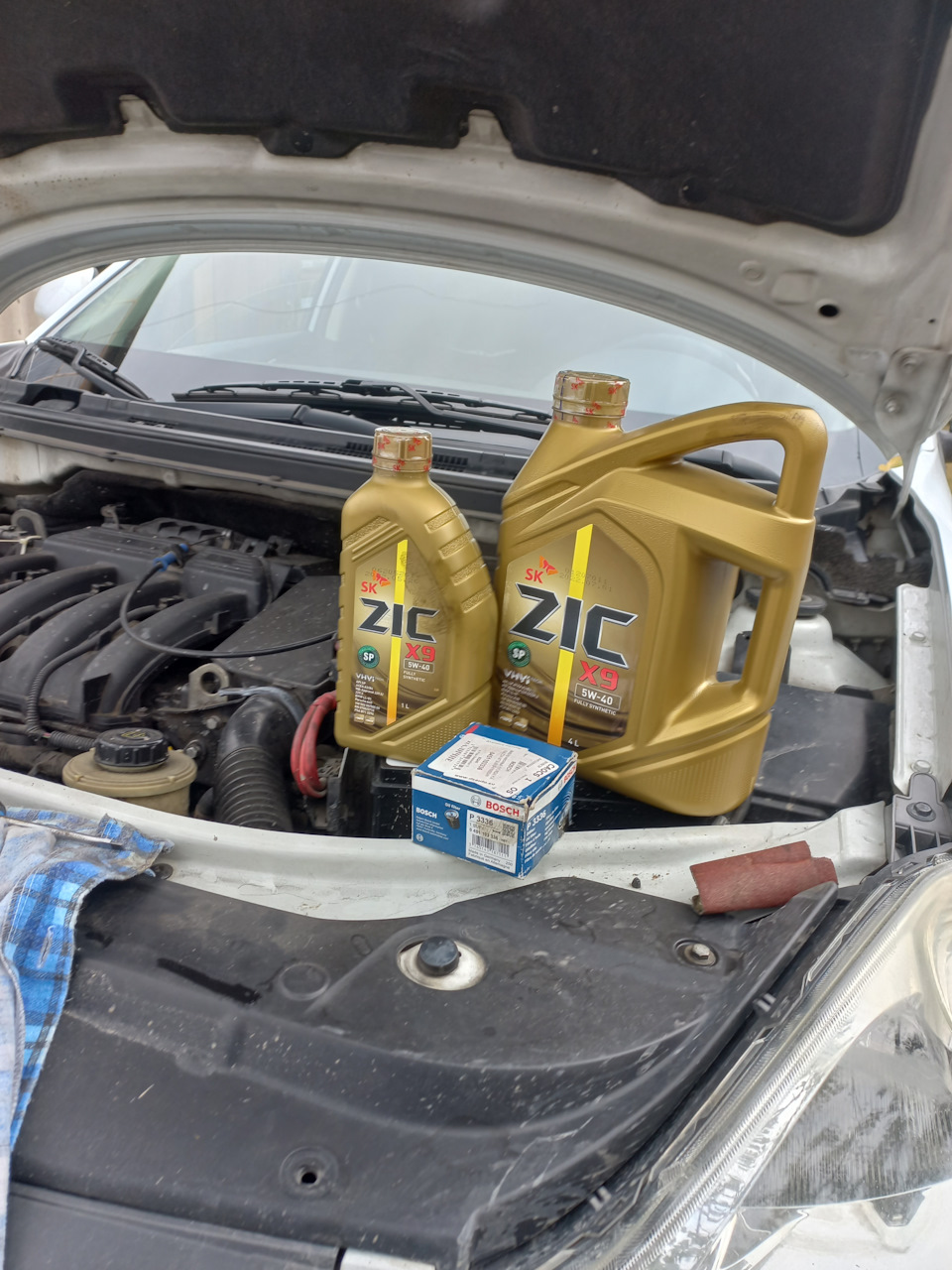 218141 км. Oil Service. Zic X9 5W40, api SP, A3/B4, MB 229.5 — Nissan  Almera V (G11/15), 1,6 л, 2014 года | плановое ТО | DRIVE2