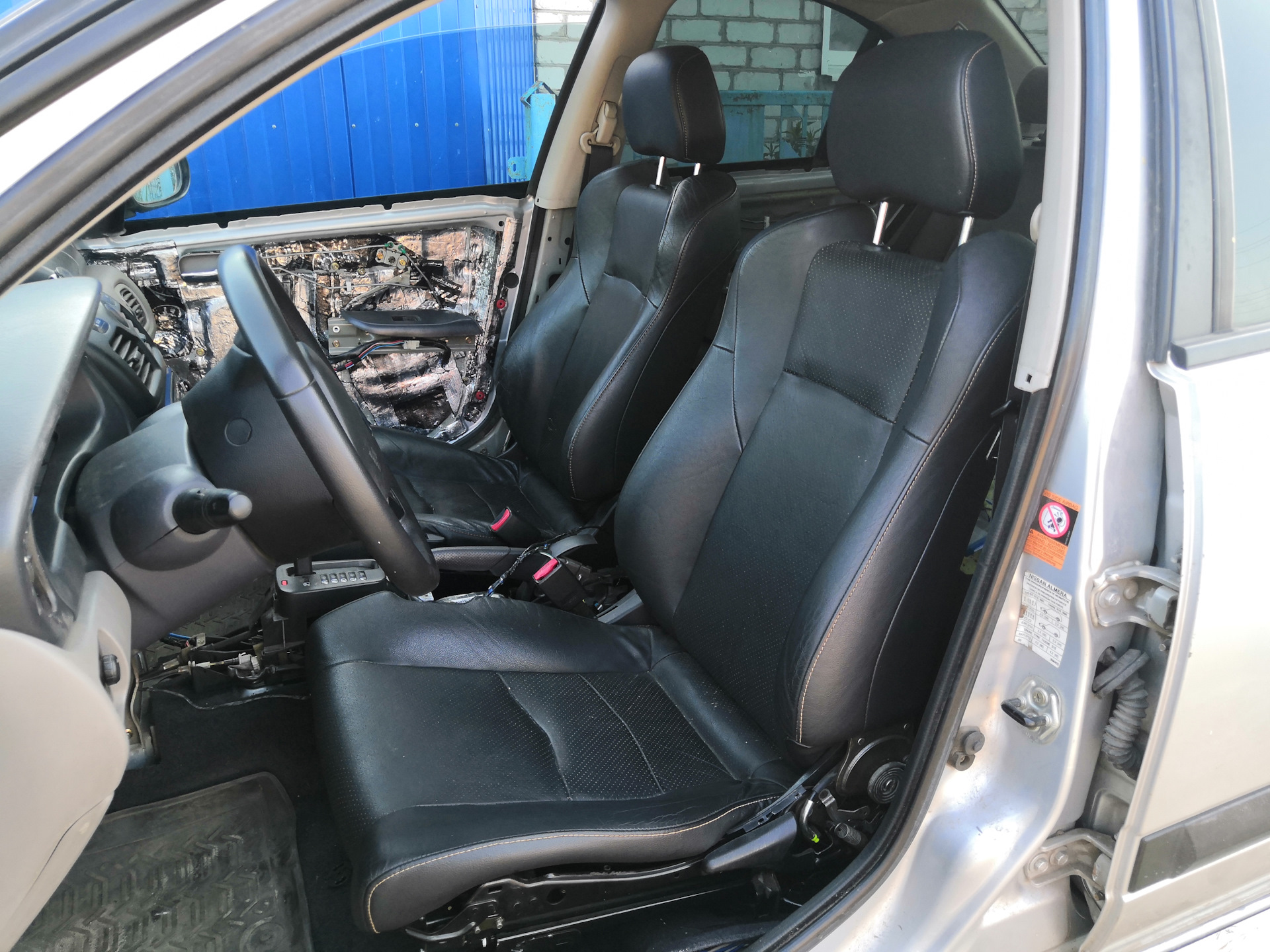 Nissan Almera II N(16) кожаные сиденья