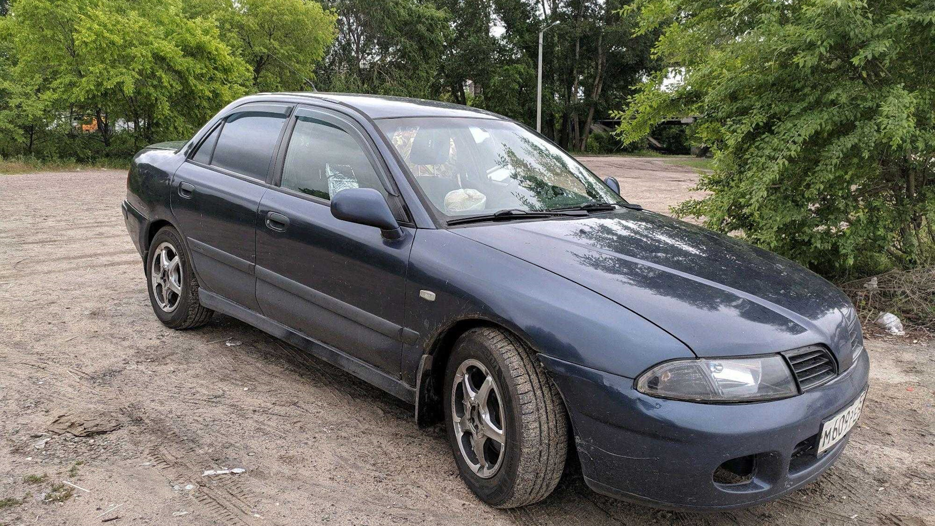 Mitsubishi carisma 2002 год. Митсубиси Каризма 2002. Митсубиси Каризма 2002 1.6. Mitsubishi Carisma 2002 года. Митсубиси Каризма 2002 голубая.