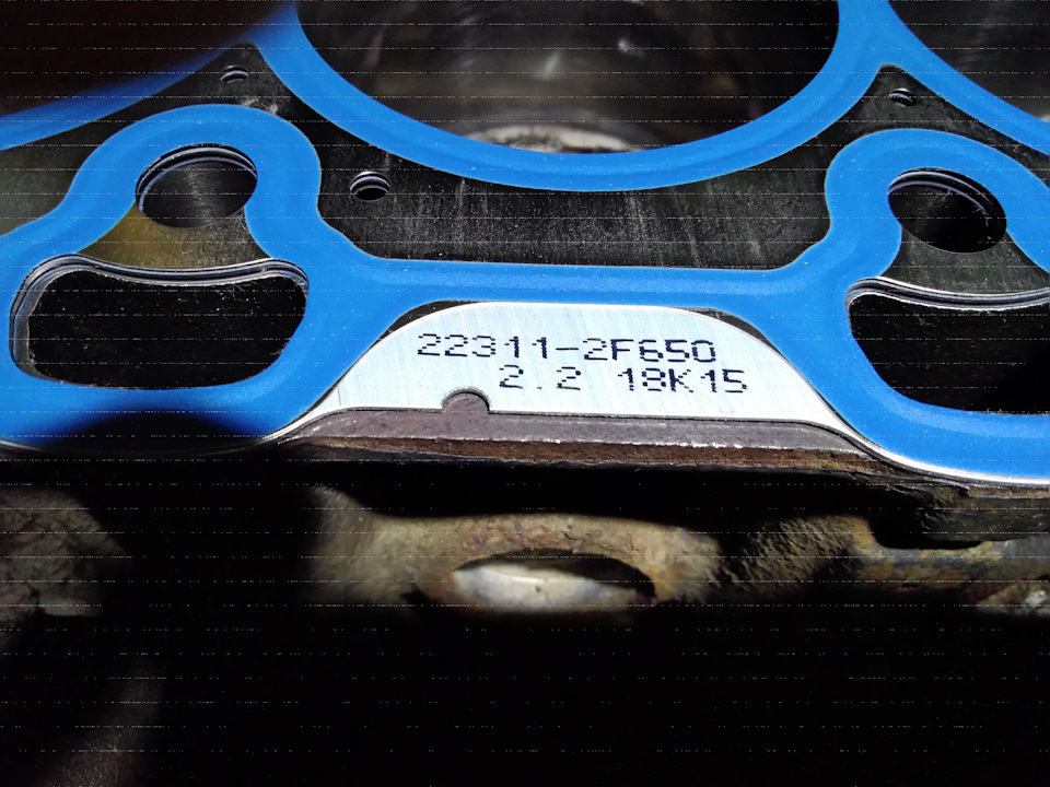 Номер прокладки — Hyundai Santa Fe (2G). Запчасти на фото: 223112F650