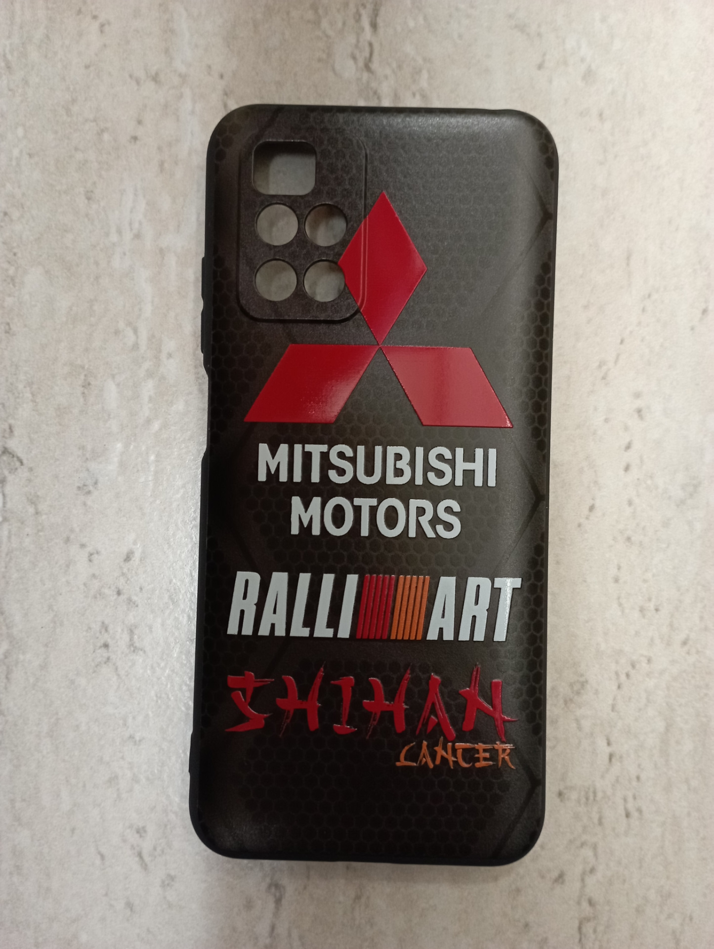 Телефон мицубиси. Чехол на телефон Митсубиси. Телефон Mitsubishi 7220. Знак Мицубиси для телефона.