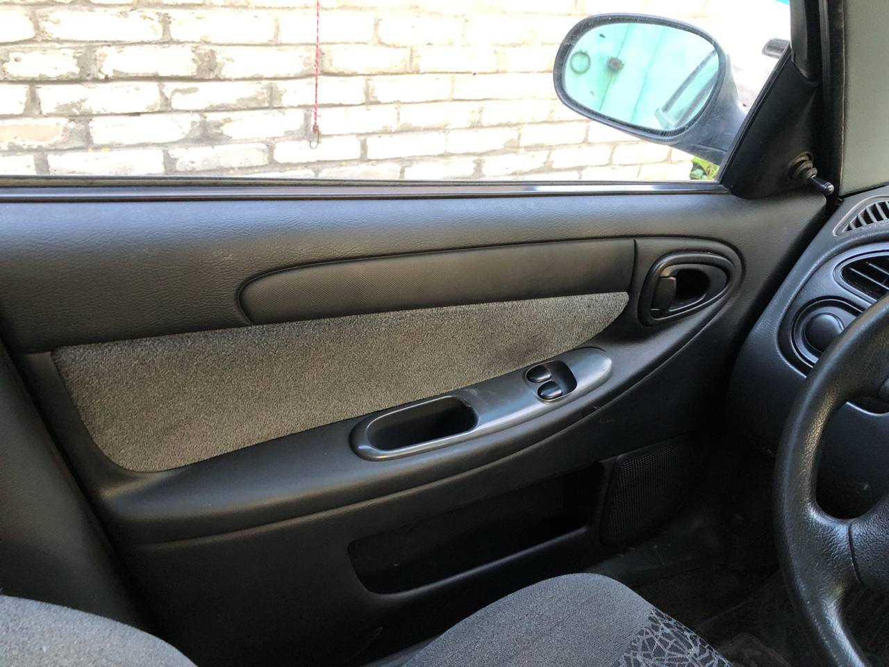 Removal of an upholstery of a forward door (Chevrolet Lanos T150 2002-2009: Body