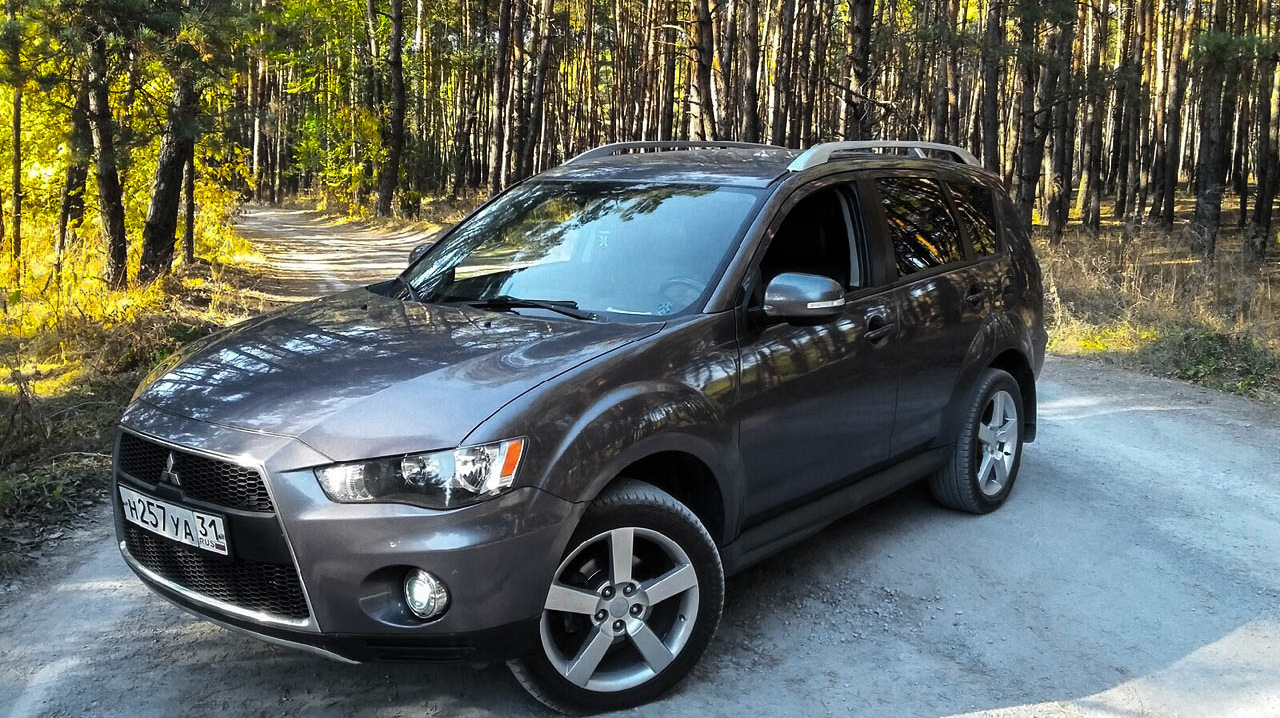 Аутлендер хл годы выпуска. Mitsubishi Outlander XL серый. Аутлендер ХЛ 3.0. Mitsubishi Outlander XL 2012 черный. Аутлендер XL отзывы.