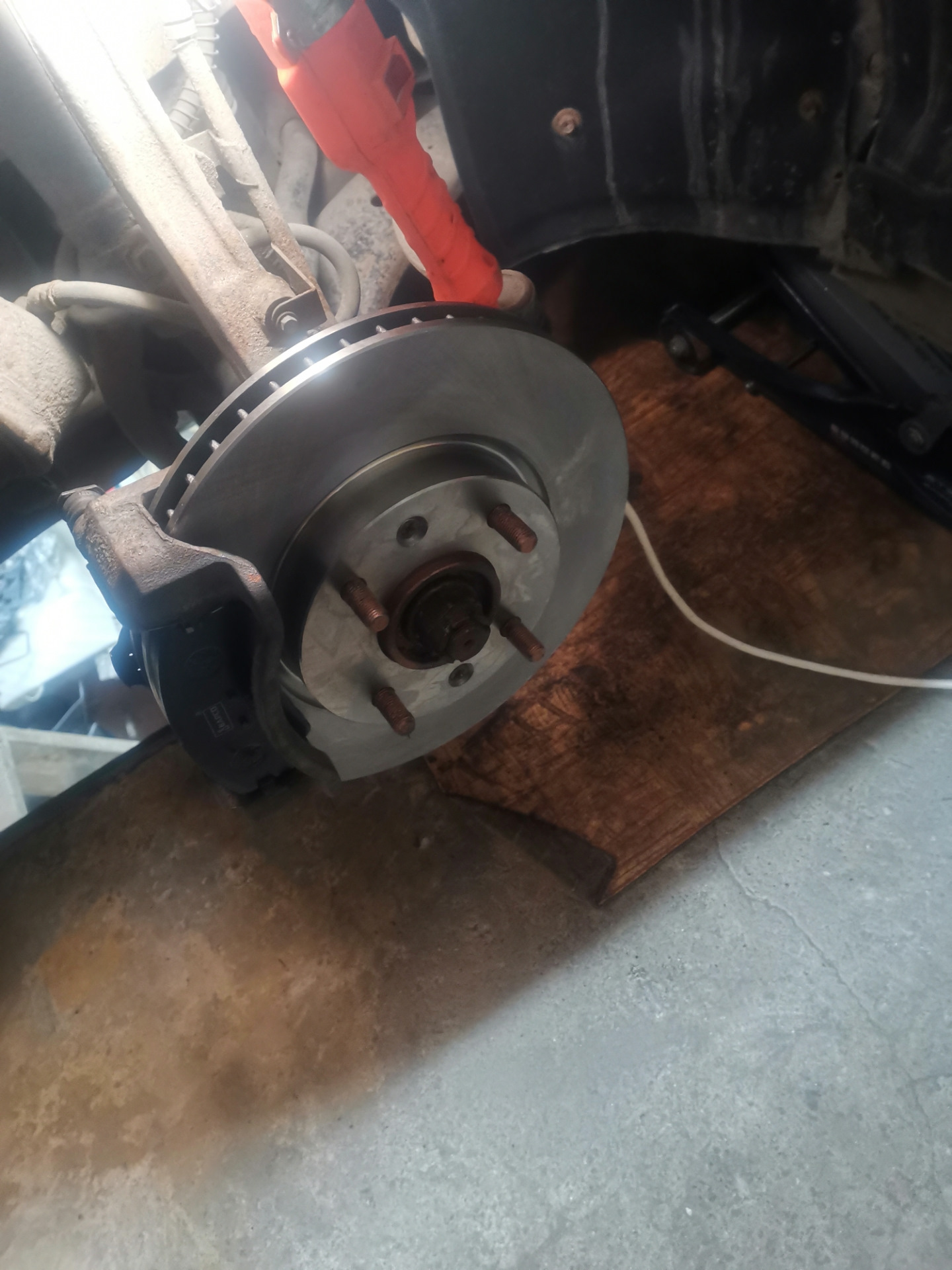 Replacing the front brake pads on a Volga GAZ 31105 car