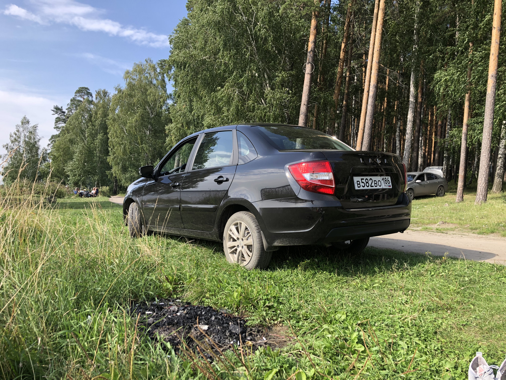 Гранта отзывы владельцев. Лада Гранта (2-е поколение). Лада Гранта 2 поколение черная. Лада Гранта номер 865. Лада Гранта седан второго поколения.