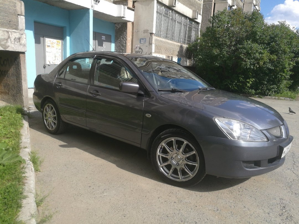 Лансер 9 205/50/16. 215 45 R17 Лансер 9. Enkei r17 7j. Enkei Tuning r17.