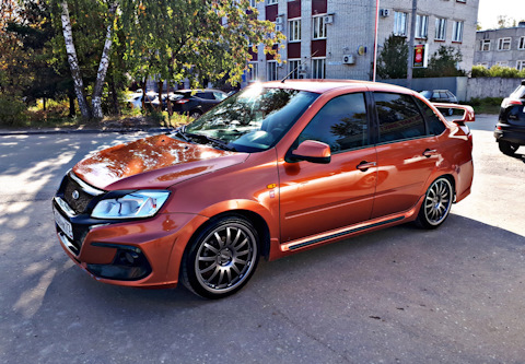 фотки с установлеными билинзами dixel 3.0 гранта спорт Апельсин - Lada Granta Sp