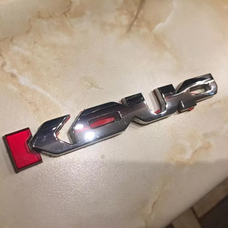 Шильдик Koup на решетку радиатора — KIA Cerato Koup (1G), 2 л, 2012 ...